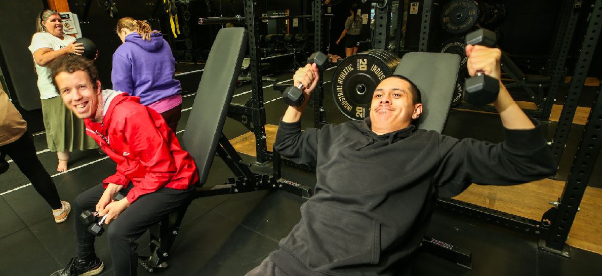 NDIS participant working out with their support working.